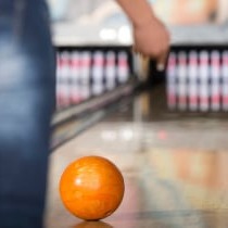 Maple Lanes lane with a orange bowling ball