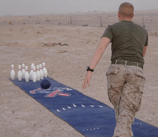 solider  bowling in the desert